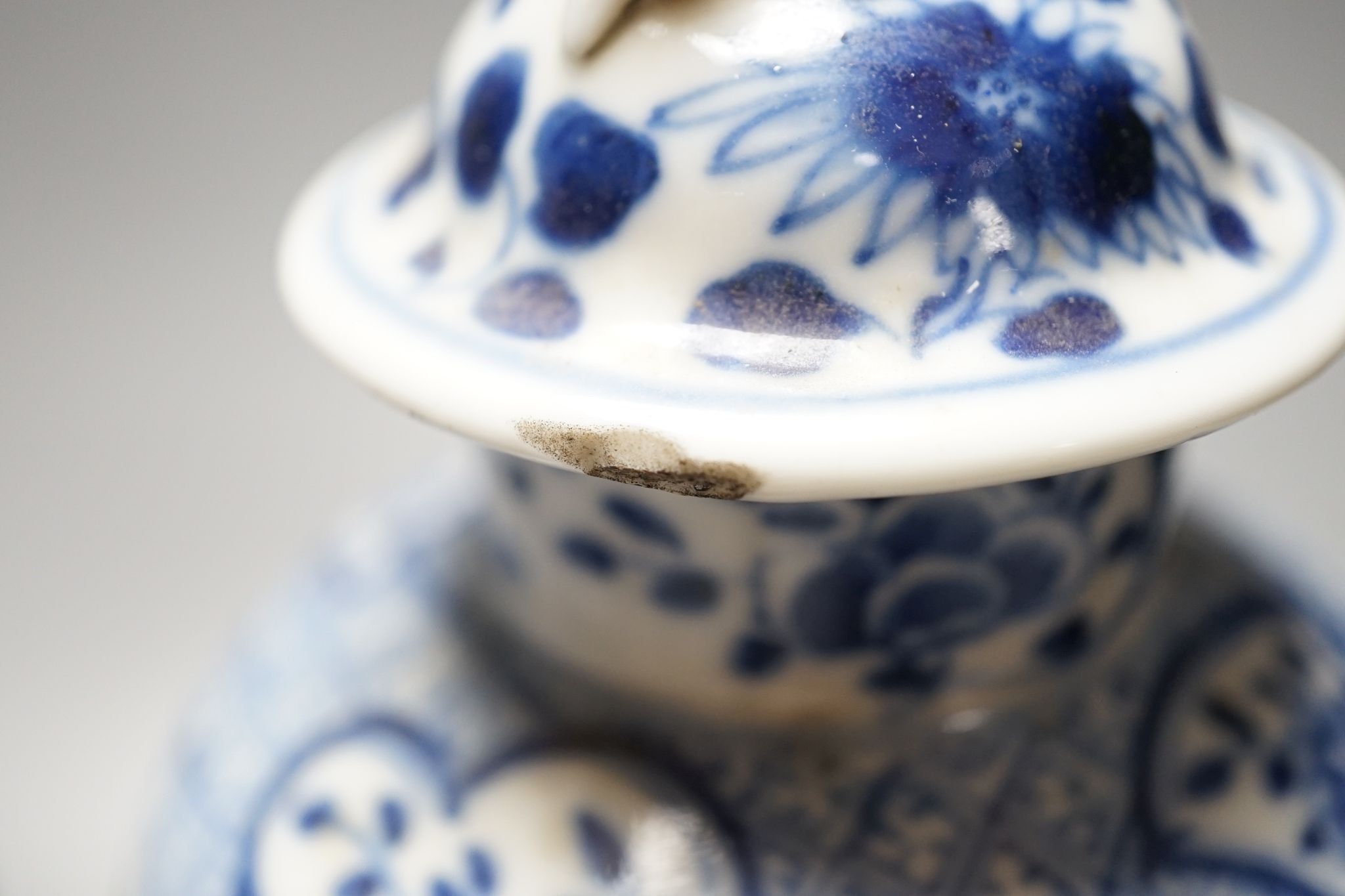 A pair of Chinese blue and white dragon vases and covers, circa 1900. 28cm